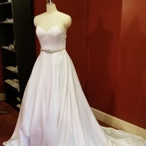 Size 14, Ivory strapless wedding gown with pleats